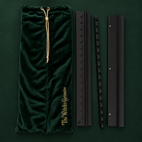 The Witch's Racks with a tile pusher and the embroidered green velvet bag
